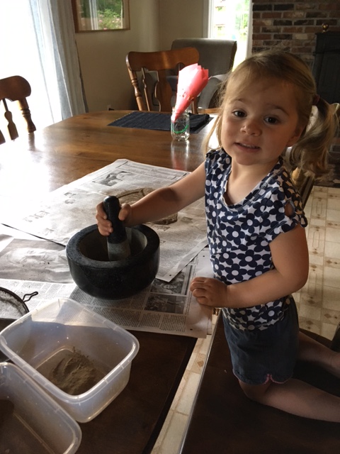 Izzy grinding dirt for the ink