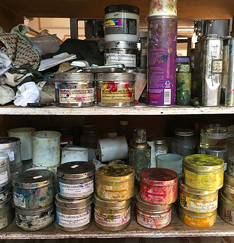 cans of printmaking inks